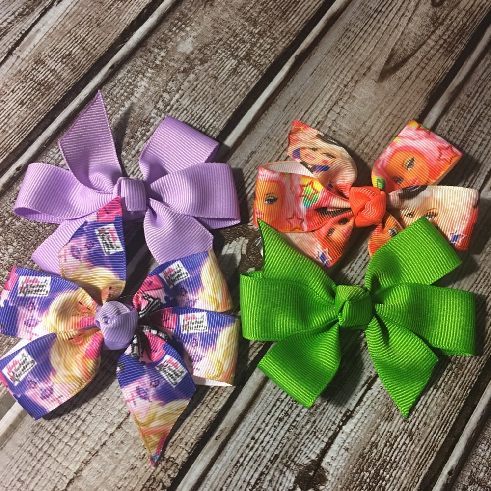 Buy 2 sets get the 3rd FREE... 4pc Barbie bows